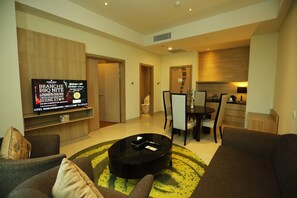 Grand Suite, 1 Bedroom | Living area | 42-inch LCD TV with satellite channels, TV
