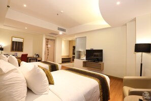 Junior Suite, 1 Bedroom, City View | Minibar, in-room safe, desk, iron/ironing board