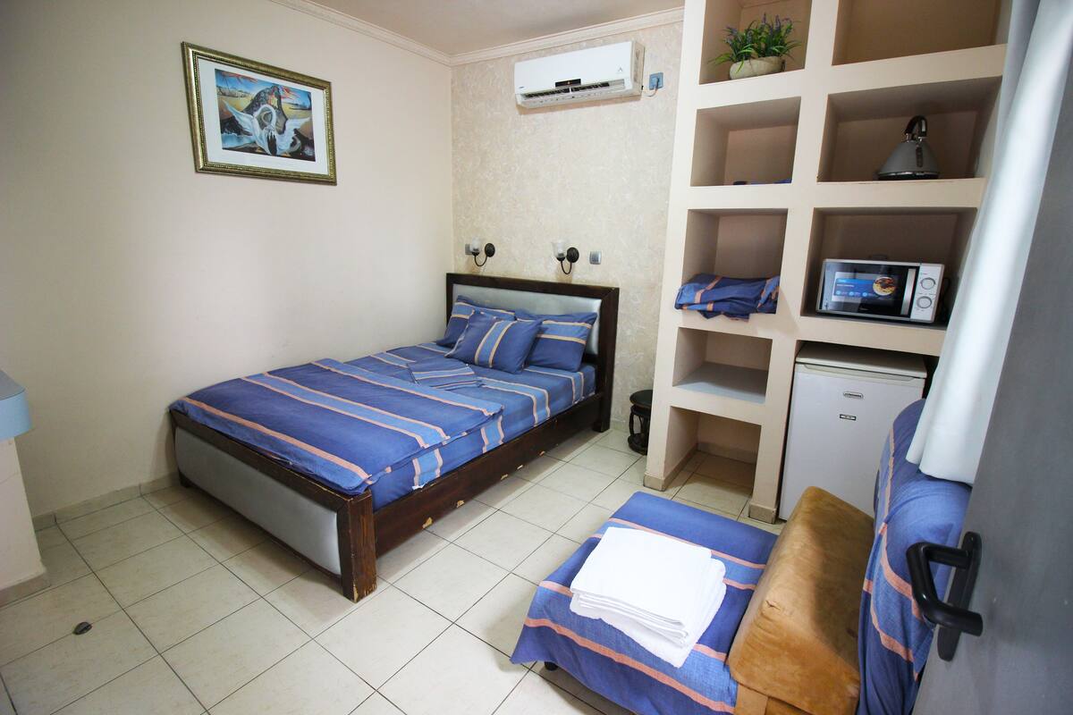 Double Room | Pillow-top beds, minibar, individually decorated, individually furnished