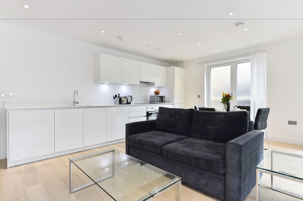 Departamento, 1 habitación | Área de sala de estar | Televisión 