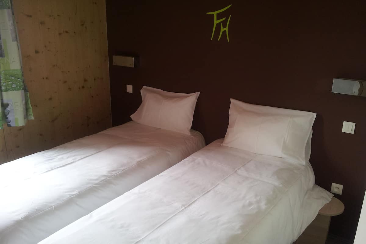 Chambre avec lits jumeaux