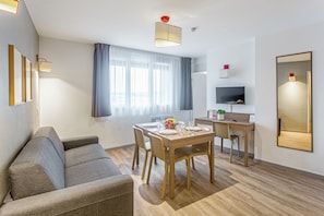 Apartment, 2 Bedrooms | Living area | Flat-screen TV - Appart'City Confort Amiens Gare (Amiens)