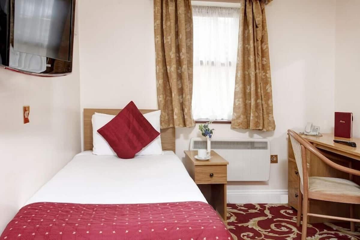 Desk, blackout curtains, iron/ironing board (on request), free WiFi