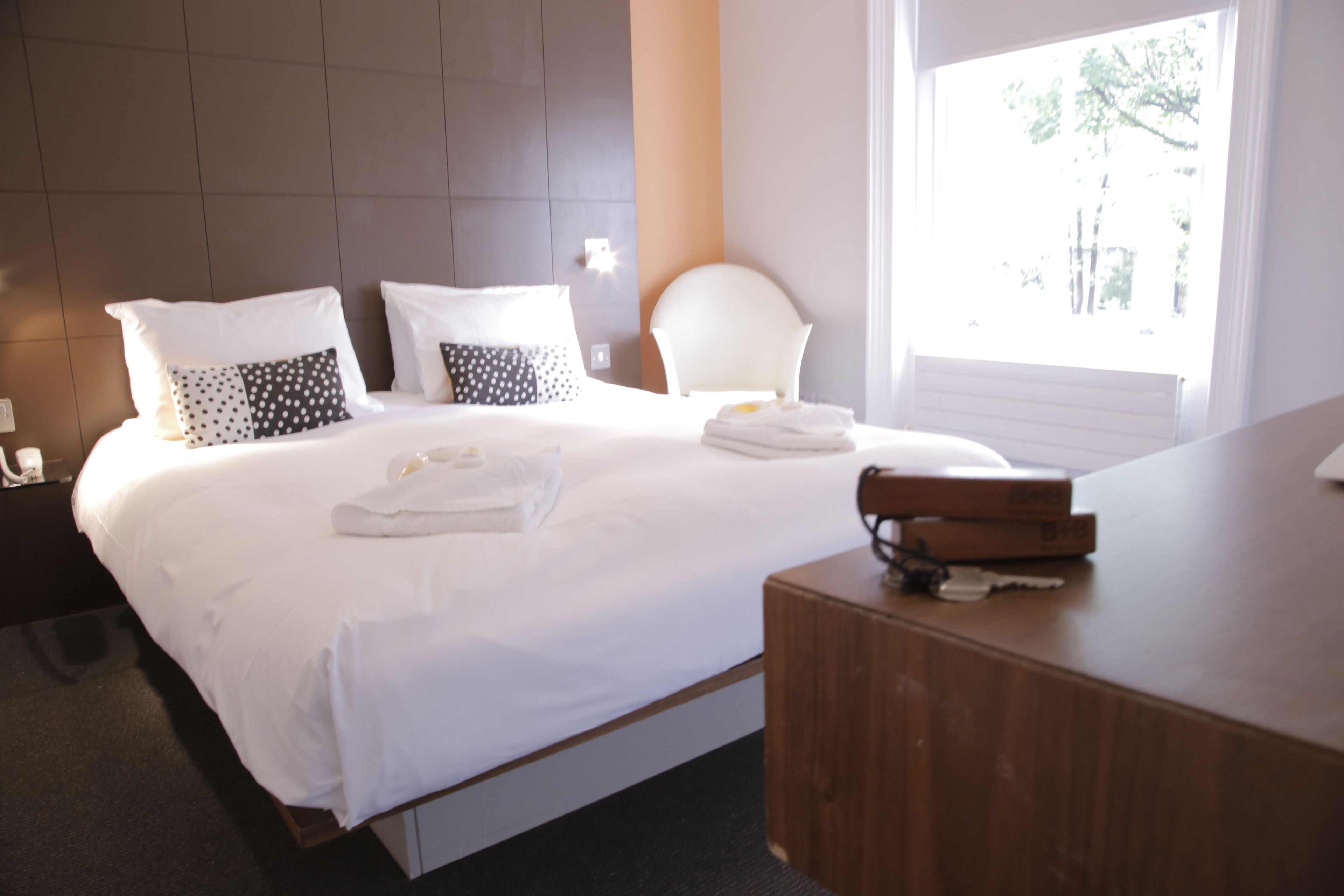 Hypo-allergenic bedding, desk, laptop workspace, iron/ironing board