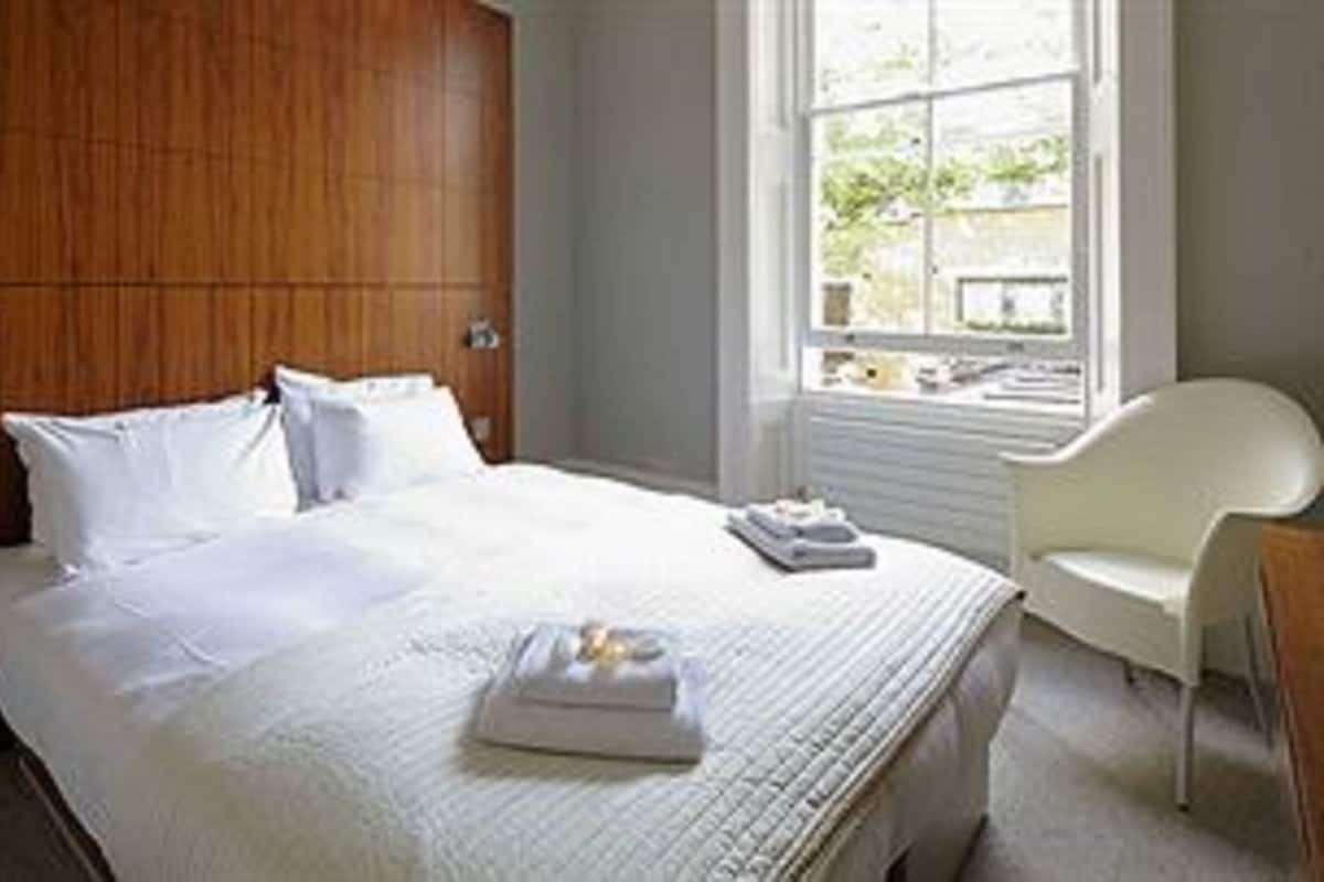 Hypo-allergenic bedding, desk, laptop workspace, iron/ironing board