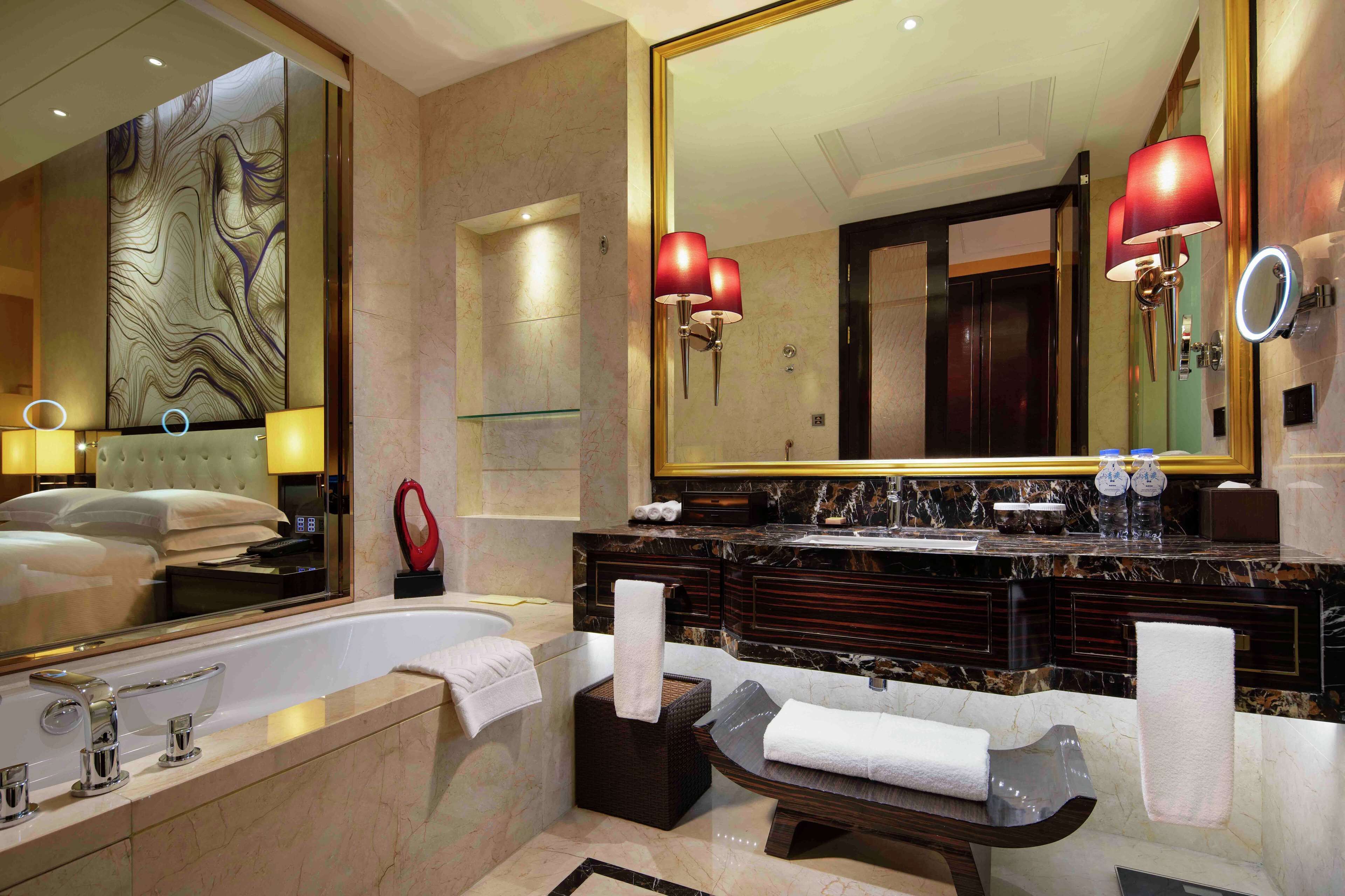 room, 1 king bed (guest) | bathroom | free toiletries, hair dryer, slippers, towels