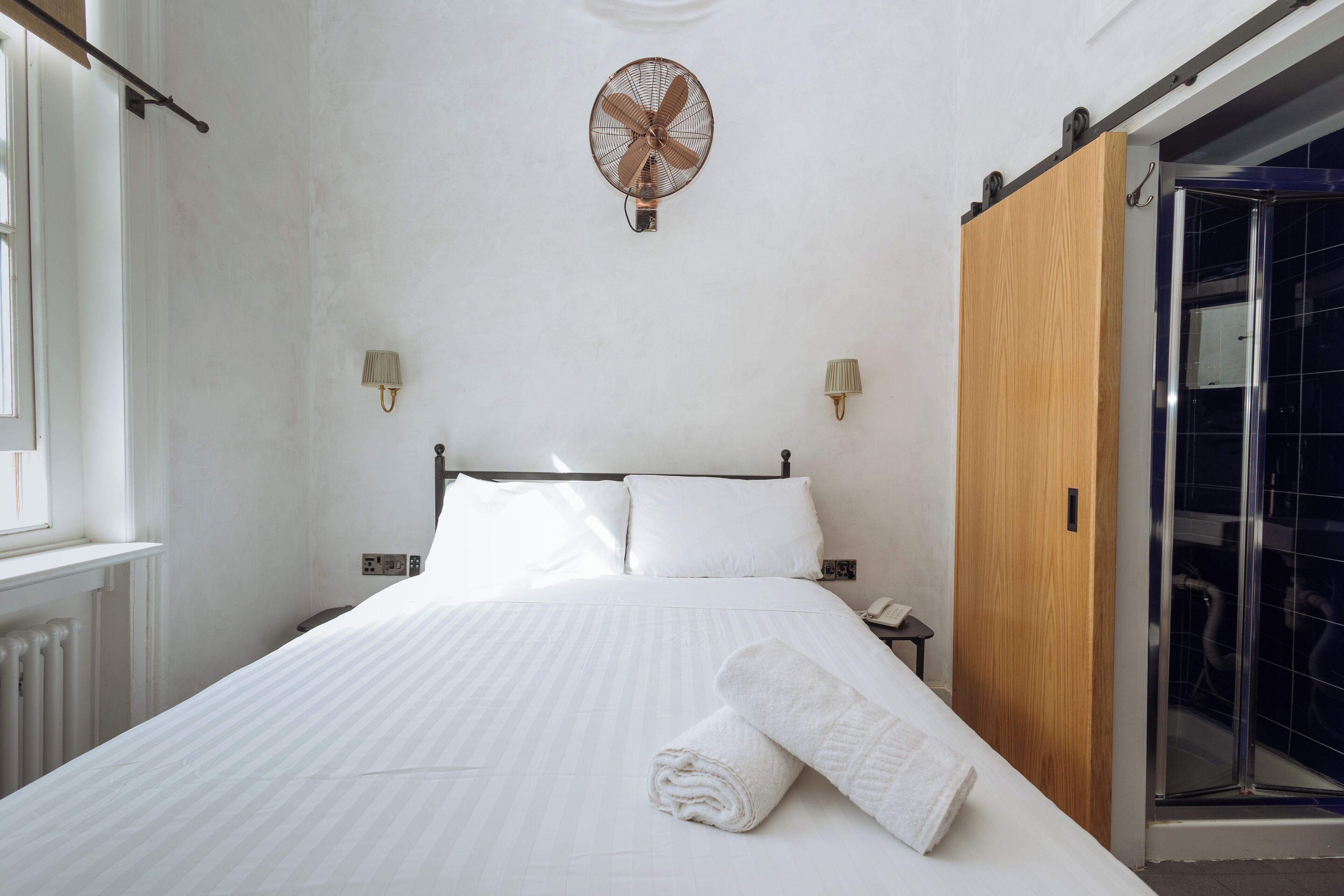 Blackout curtains, iron/ironing board, free WiFi, bed sheets