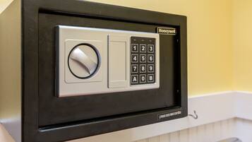 A Honeywell electronic keypad lock on a wall.