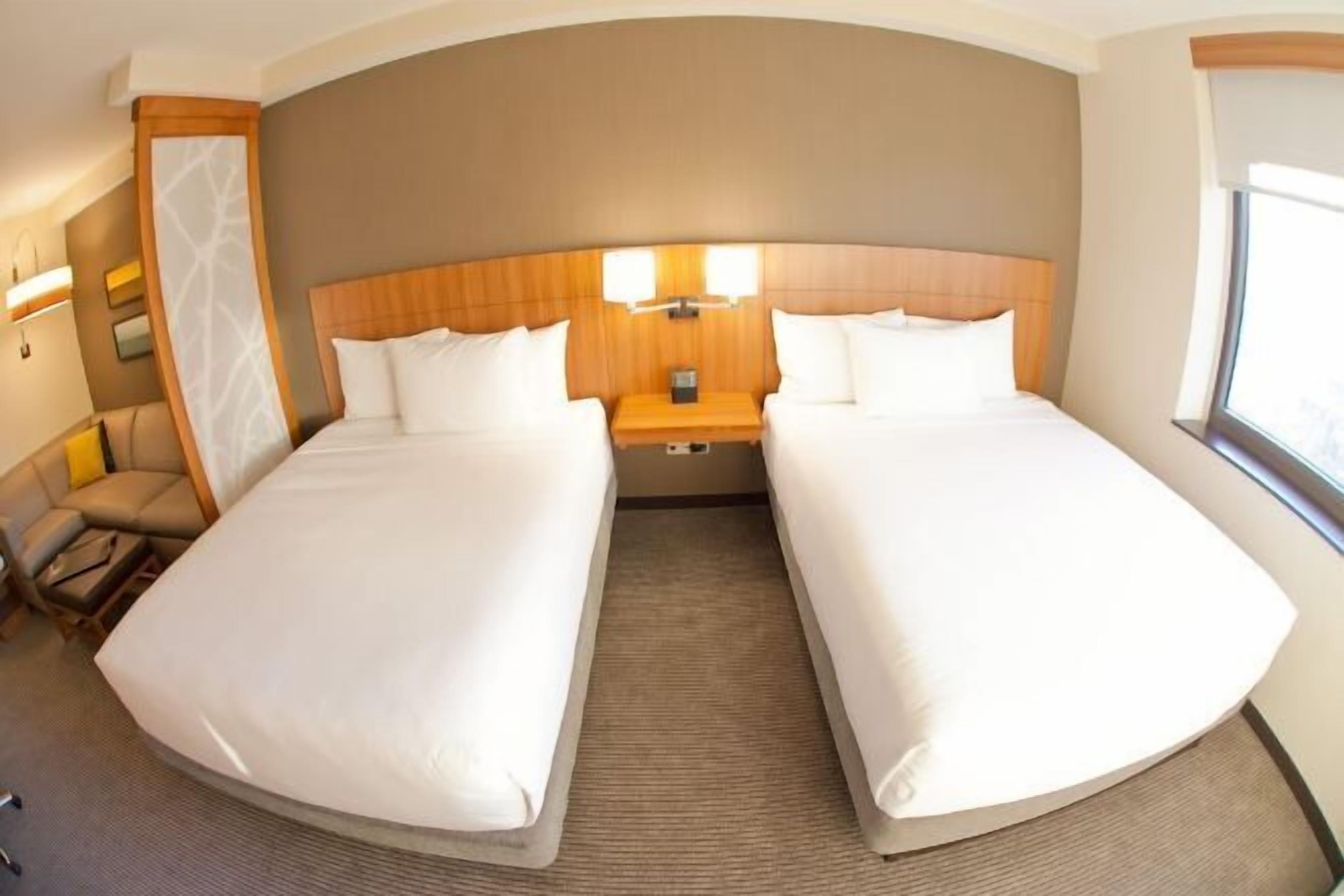 1 bedroom, hypo-allergenic bedding, down comforters, in-room safe