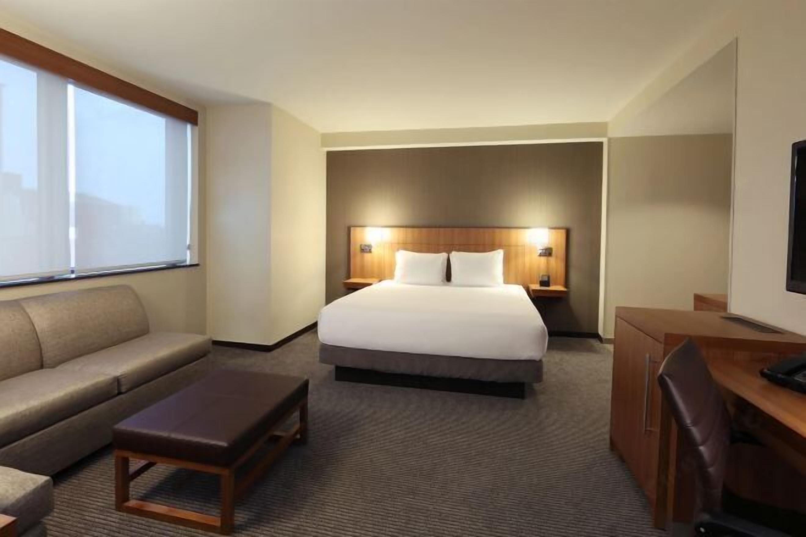 1 bedroom, hypo-allergenic bedding, down comforters, in-room safe