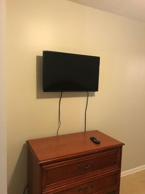 Desk, laptop workspace, blackout curtains, iron/ironing board