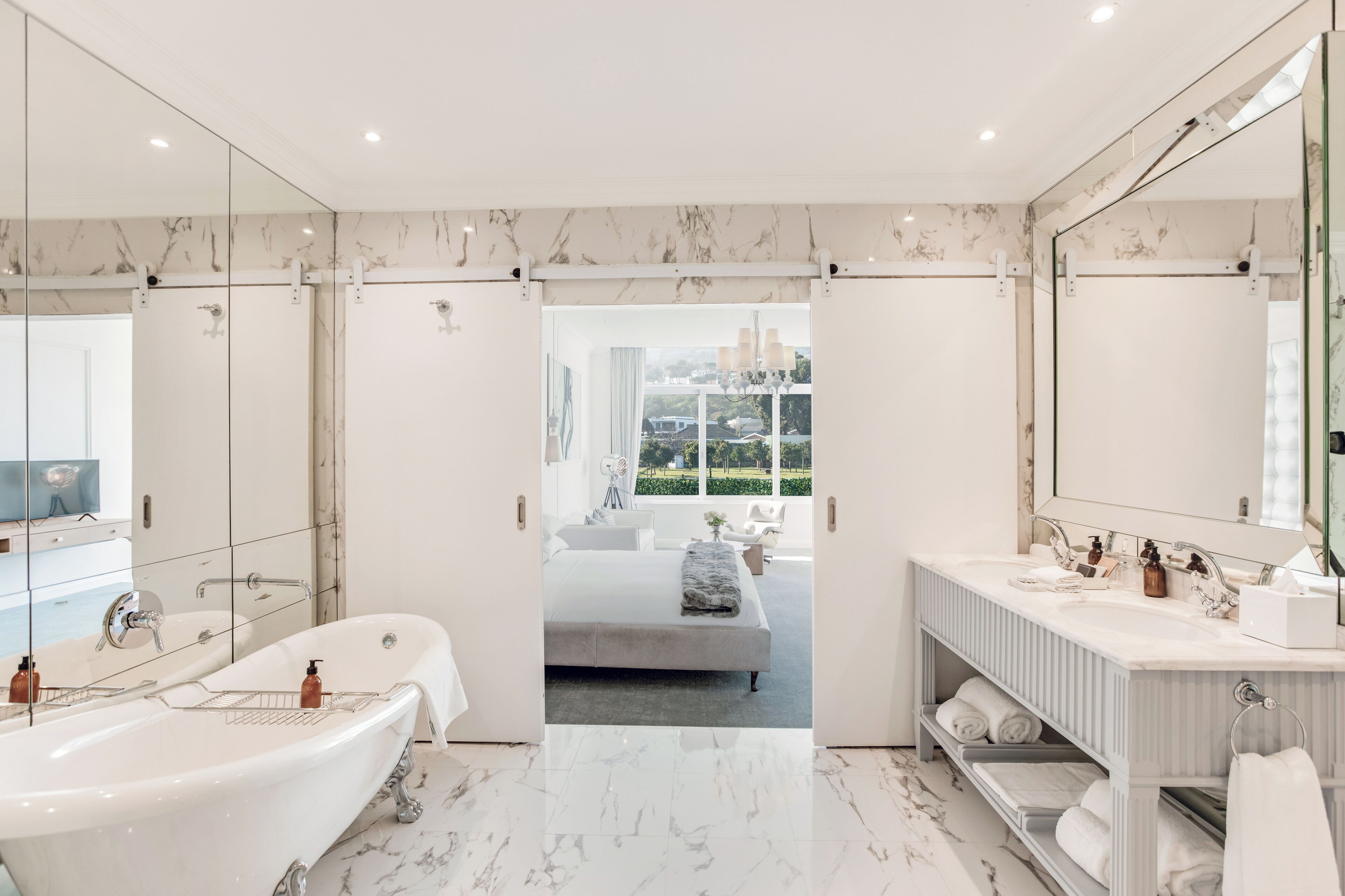 superior room | bathroom | designer toiletries, hair dryer, towels