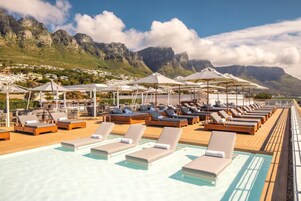 Outdoor pool, pool umbrellas, sun loungers