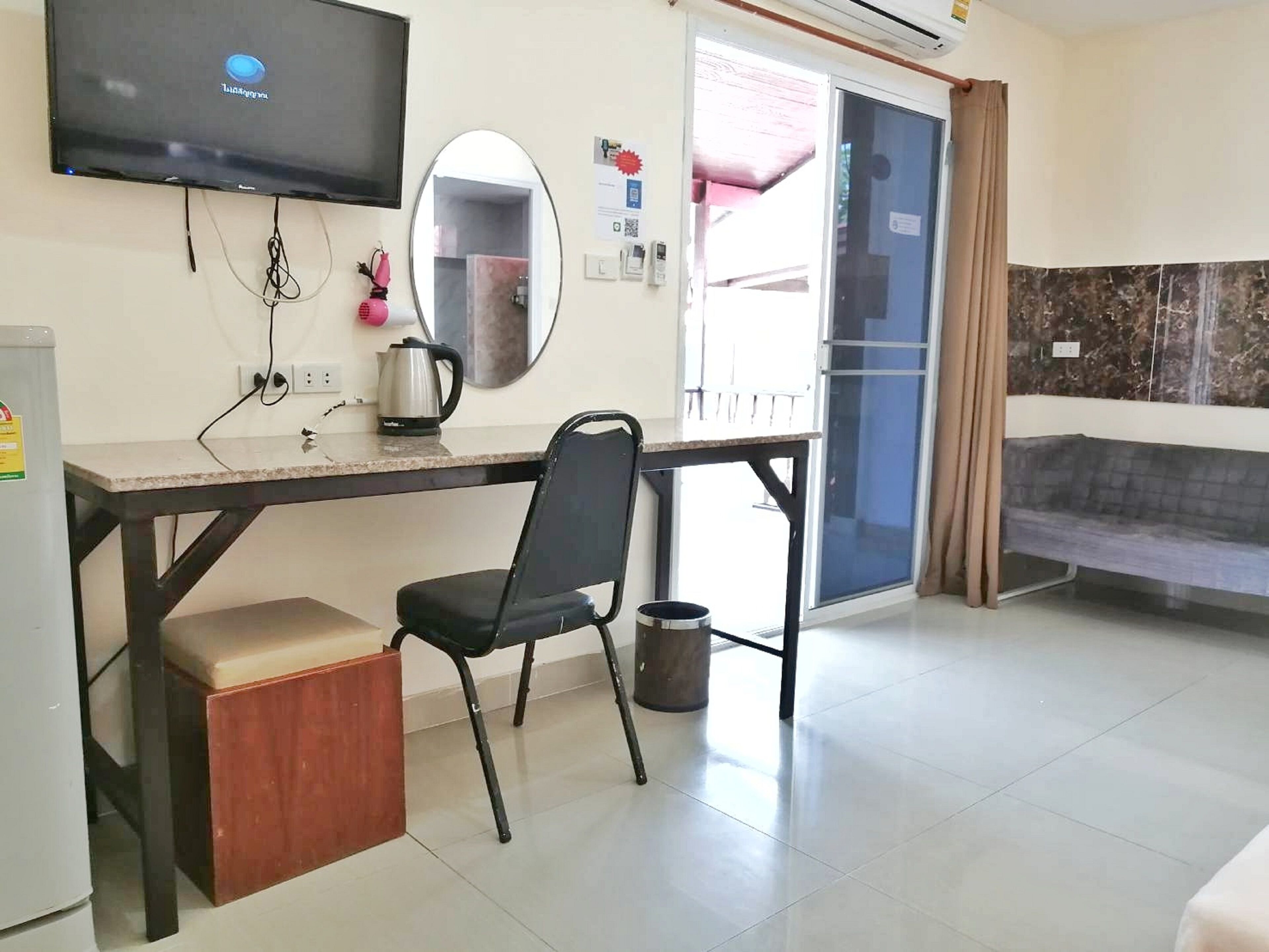 family triple room, 1 bedroom, patio | living area