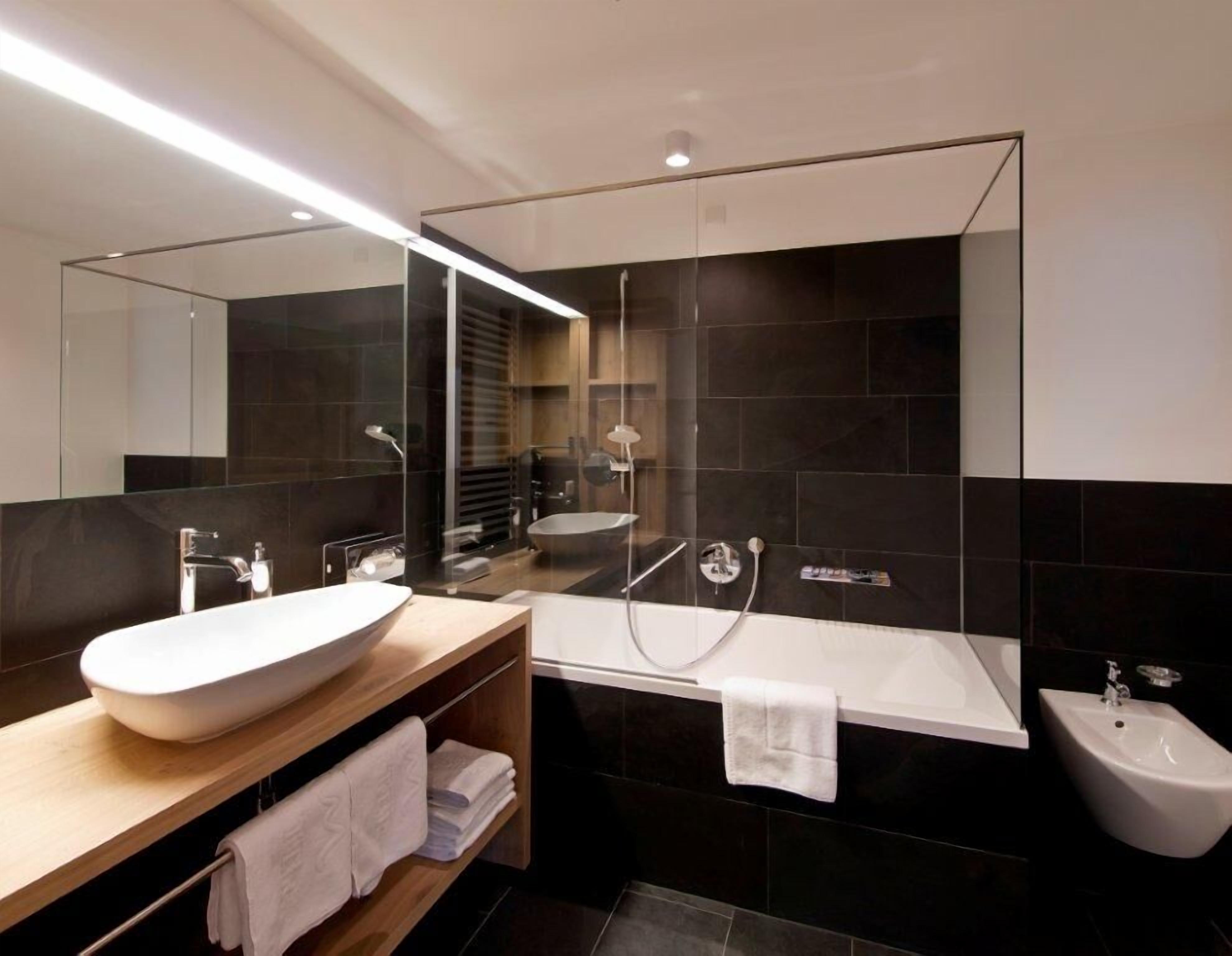 Eco-friendly toiletries, hair dryer, bathrobes, slippers