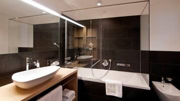 Eco-friendly toiletries, hair dryer, bathrobes, slippers