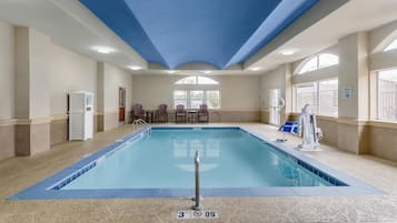 Indoor pool, open 9:00 AM to 10:00 PM, pool loungers