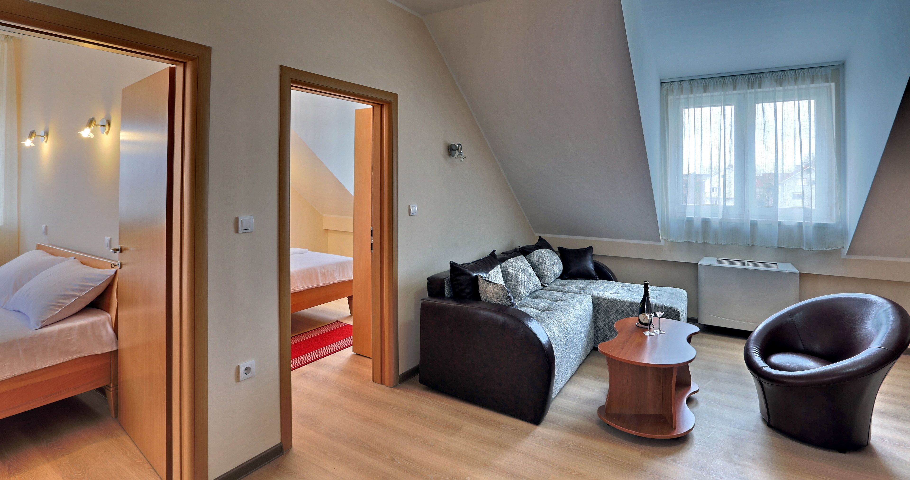 Junior Suite | Living area | Flat-screen TV