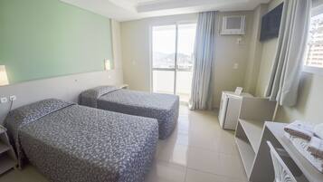 Twin Room, 2 Single Beds | Minibar, in-room safe, desk, free cots/infant beds