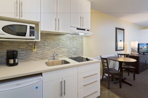 Mini-fridge, microwave, coffee/tea maker, electric kettle