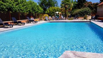 Outdoor pool, pool umbrellas, pool loungers