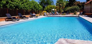 Outdoor pool, pool umbrellas, pool loungers