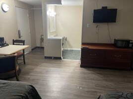 Standard Room, 2 Queen Beds | Living area | TV