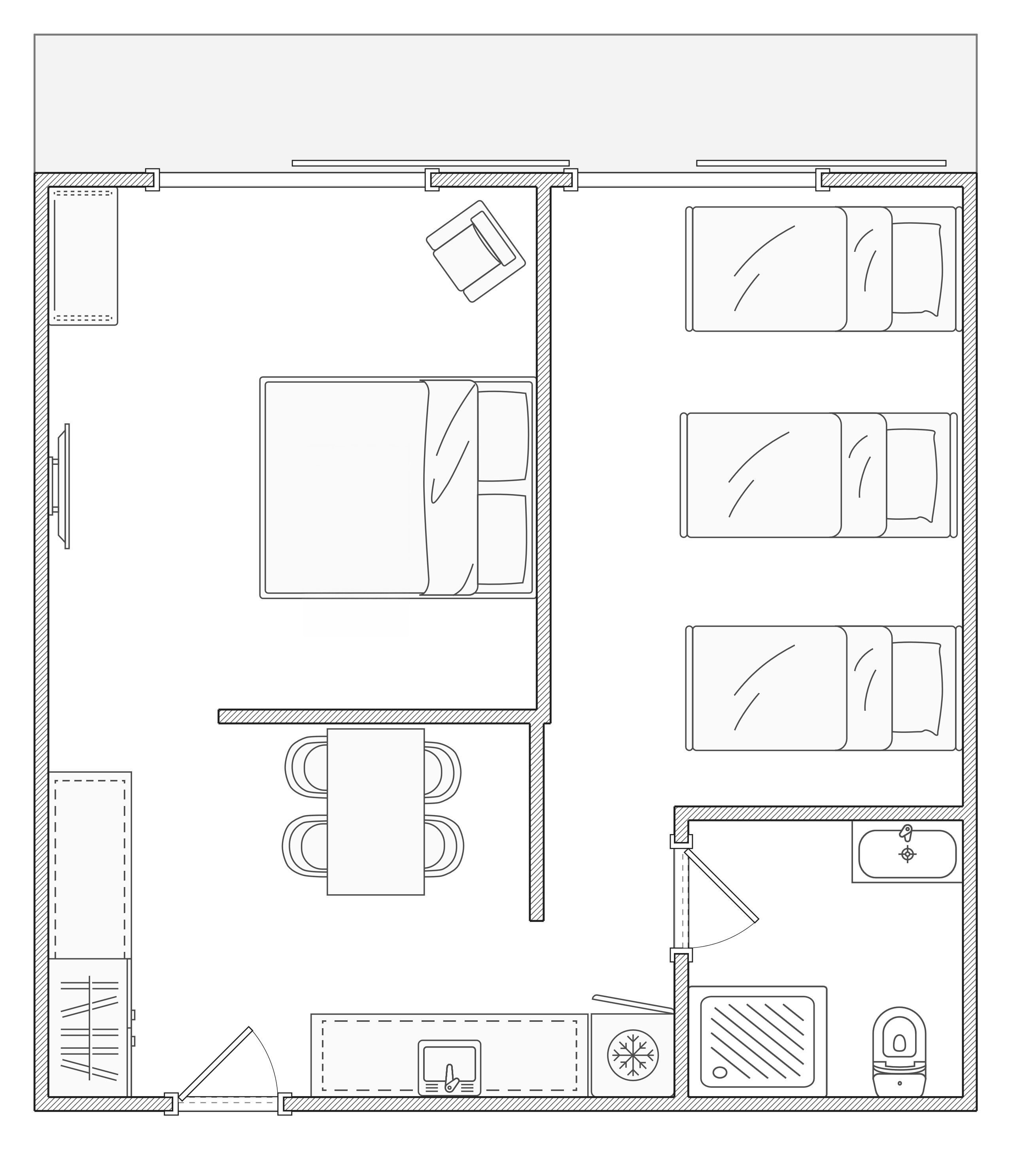 A floor plan of a hotel room with a bed, desk, chair, and a small bathroom.