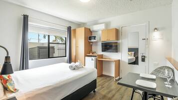 Compact Queen Room - Pet Friendly | Premium bedding, individually decorated, individually furnished