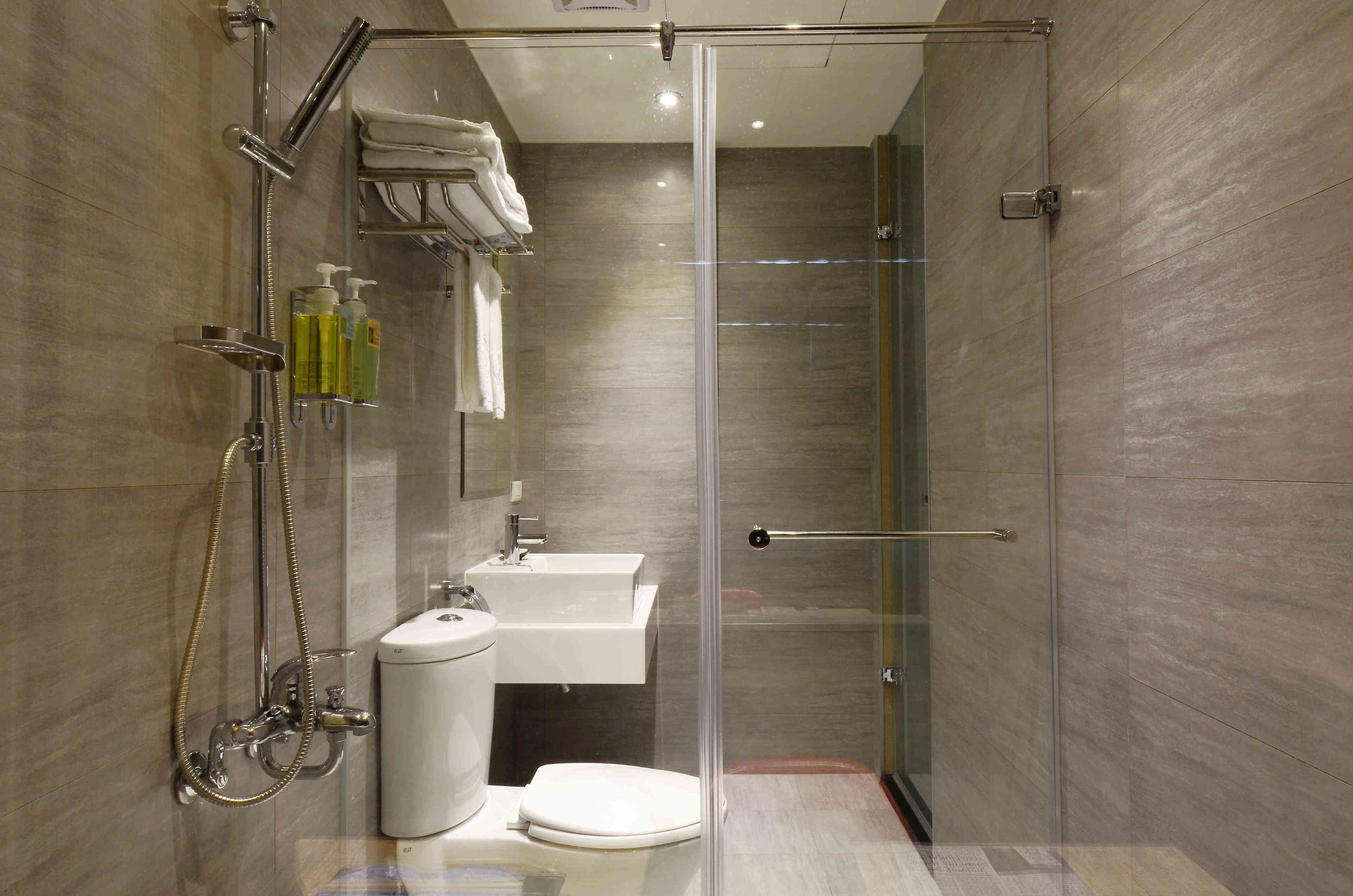 shower, hair dryer, slippers, towels