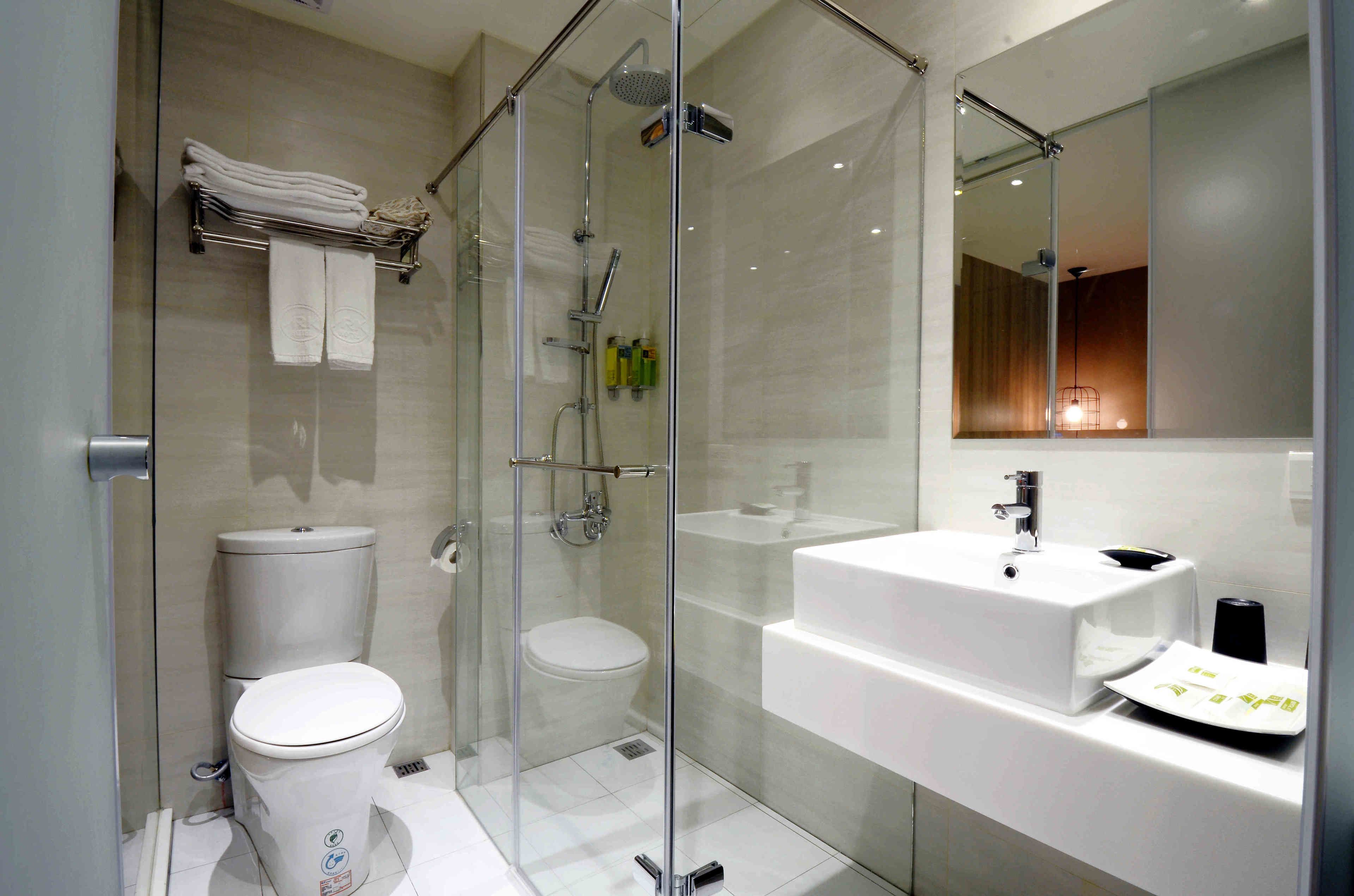 standard room, no windows | bathroom | shower, hair dryer, slippers, towels