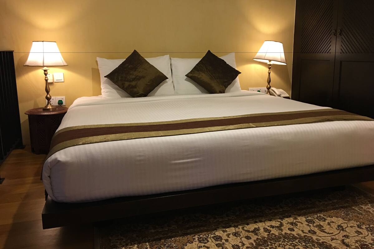 Premium bedding, in-room safe, desk, iron/ironing board (on request)