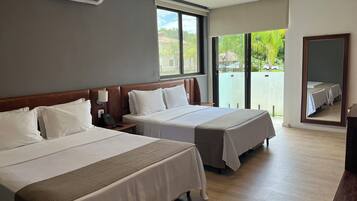 Suite Luxo Superior | Frigobar, cofres nos quartos, Wi-Fi de cortesia, roupa de cama