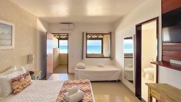 Habitación Confort, vista al mar | Ropa de cama de alta calidad y caja de seguridad en la habitación