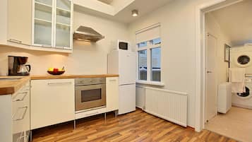 Apartment, 1 Bedroom, Balcony | Private kitchen | Fridge, microwave, stovetop, coffee/tea maker