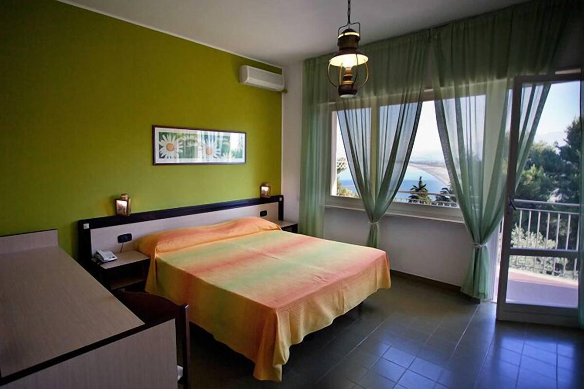 Premium bedding, down duvets, in-room safe, desk