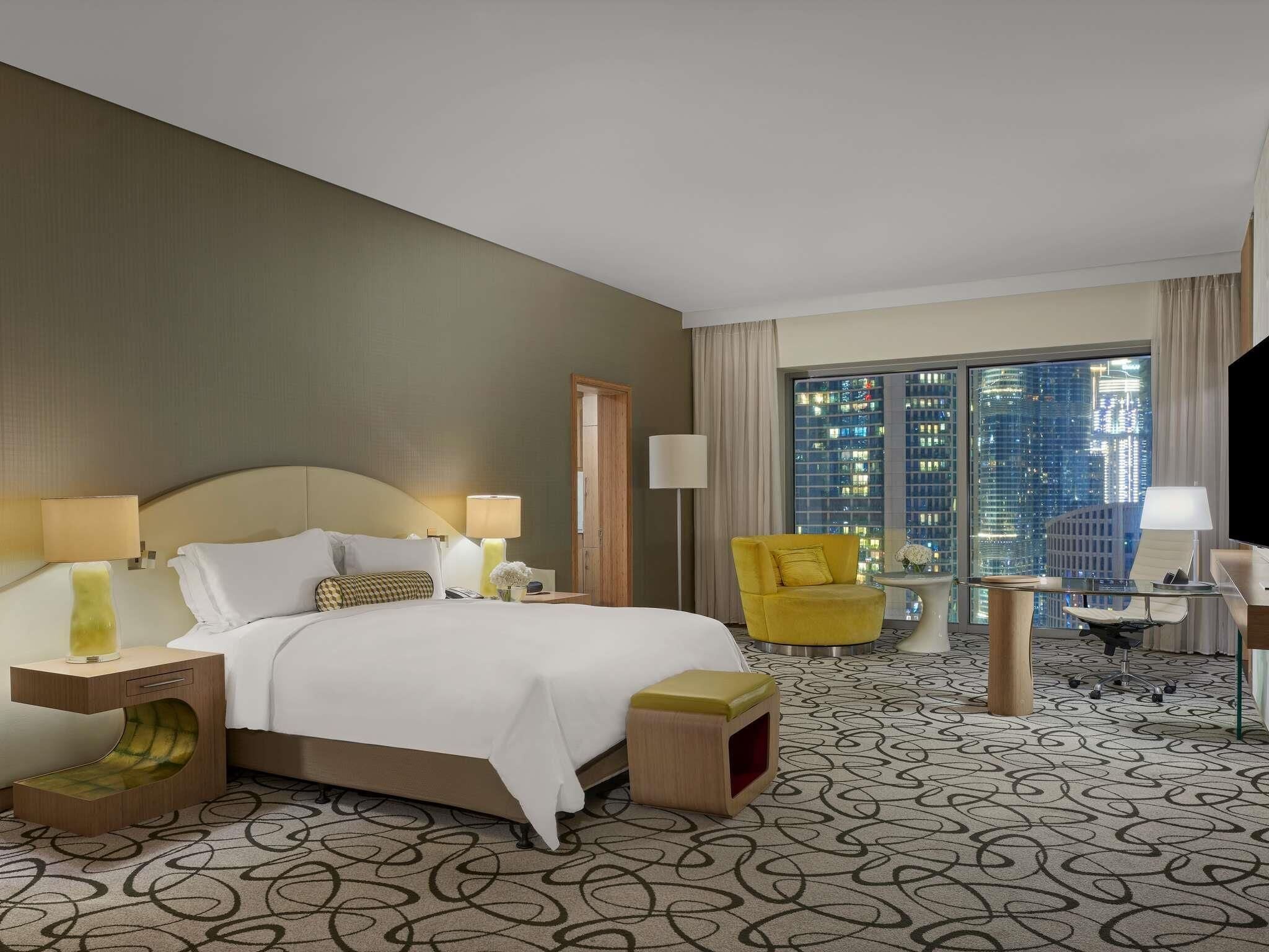 Premium bedding, down comforters, minibar, in-room safe