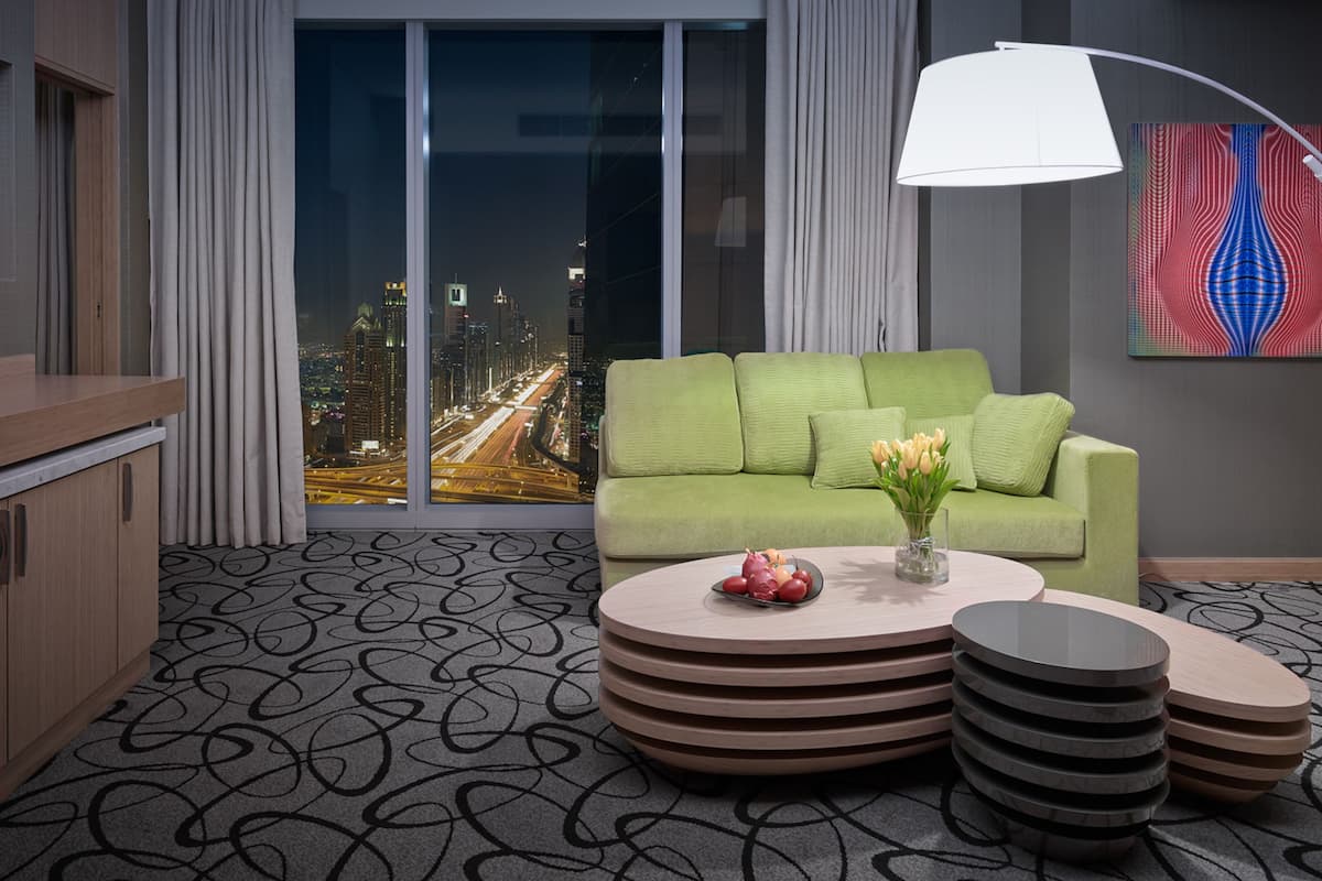 Opera Suite, 1 King Bed, Club Millésime access, Coastline View | Living area | 40-inch flat-screen TV with satellite channels, TV