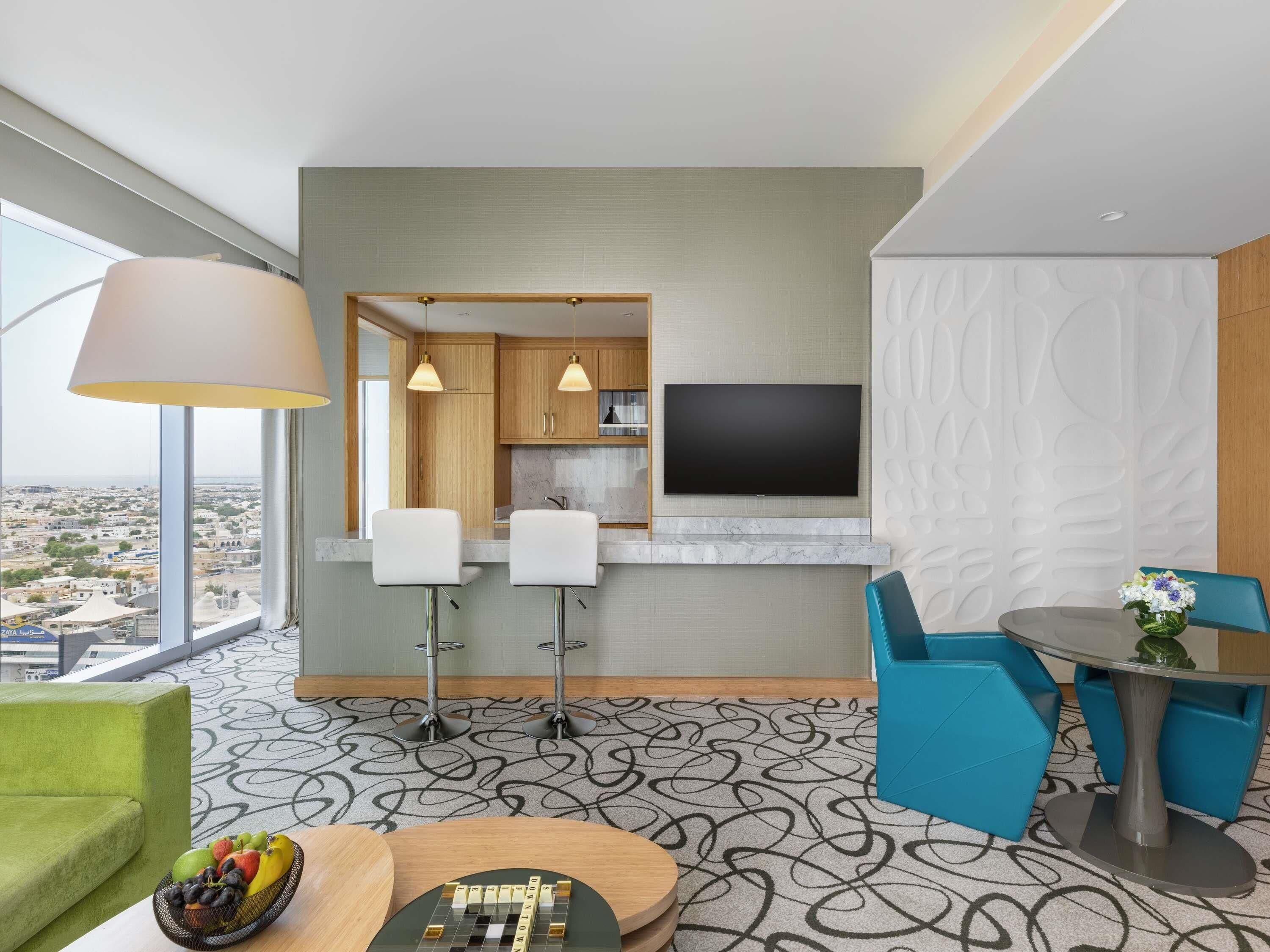 高档床上用品、羽绒被、迷你吧、客房内保险箱