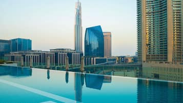 2 outdoor pools, pool umbrellas, pool loungers