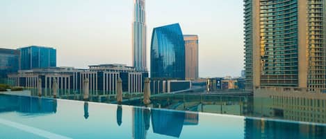 2 outdoor pools, pool umbrellas, pool loungers