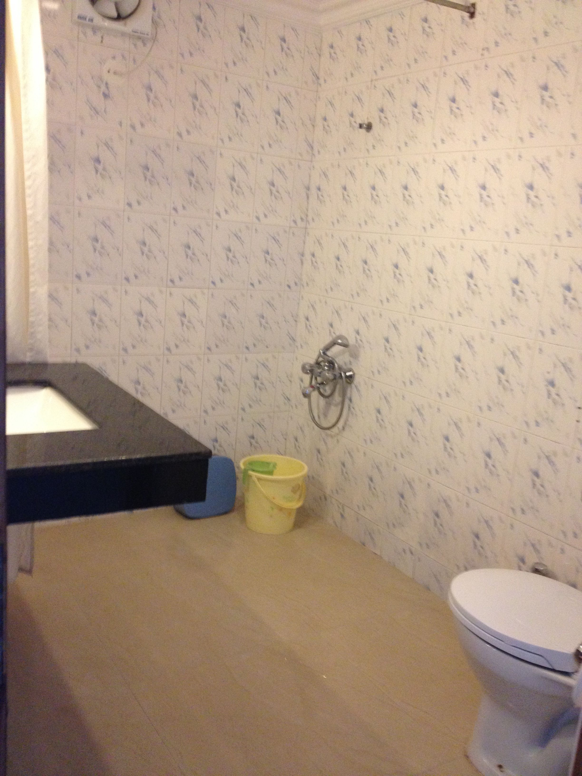 standard room (non a/c) | bathroom | shower, free toiletries, hair dryer, slippers