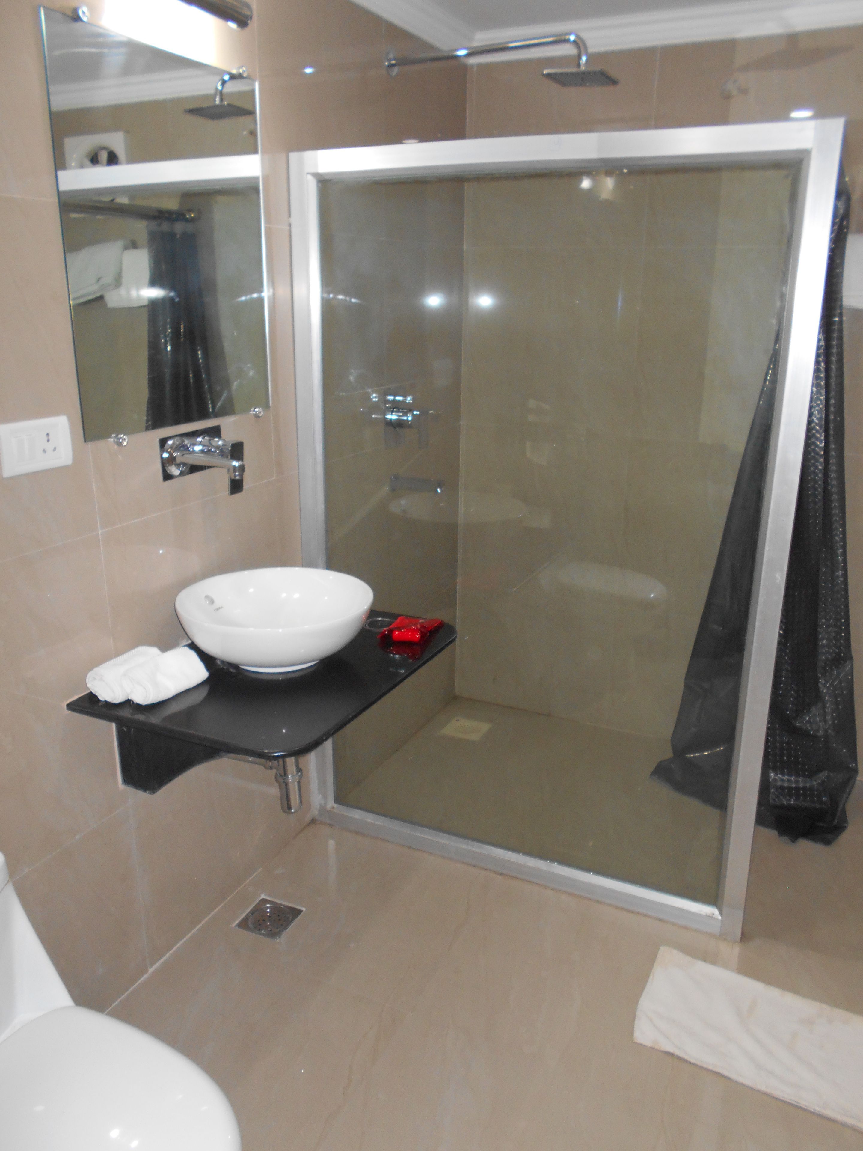 king room | bathroom | shower, free toiletries, hair dryer, slippers