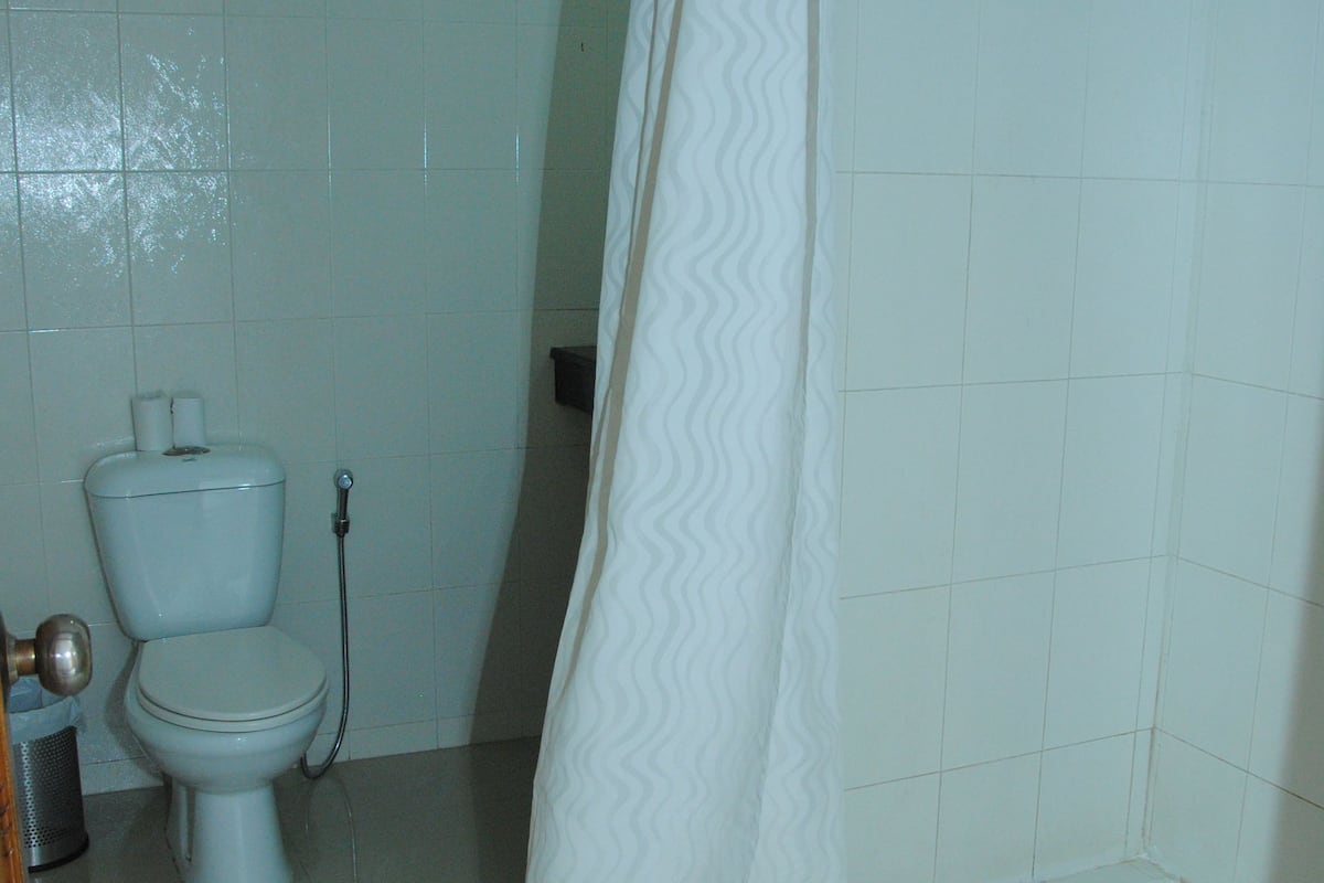 superior double or twin room | bathroom | shower, free toiletries, hair dryer, slippers