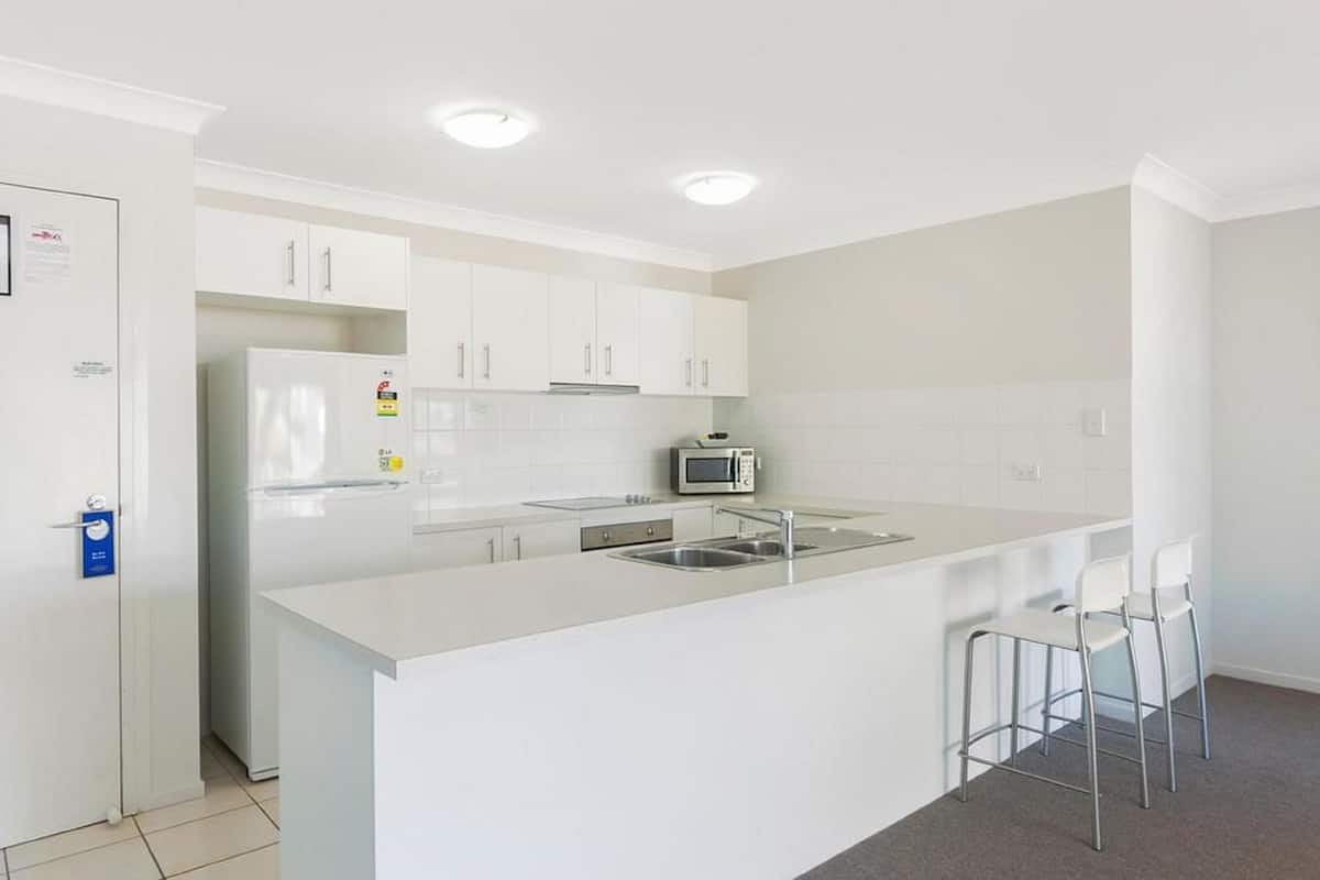 Deluxe 1 Bedroom Apartment | Private kitchen | Fridge, microwave, coffee/tea maker, toaster