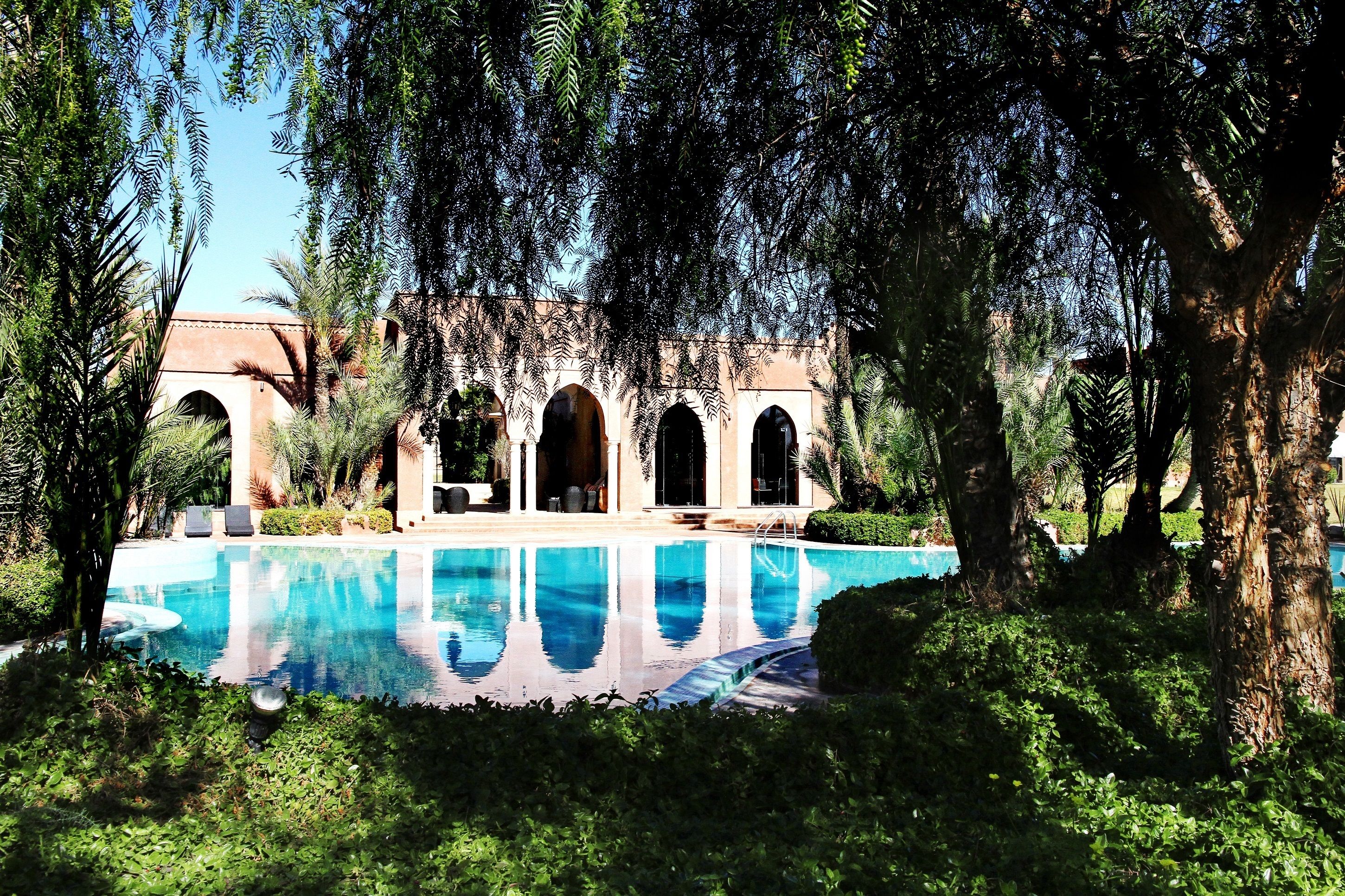 outdoor pool, pool umbrellas, pool loungers