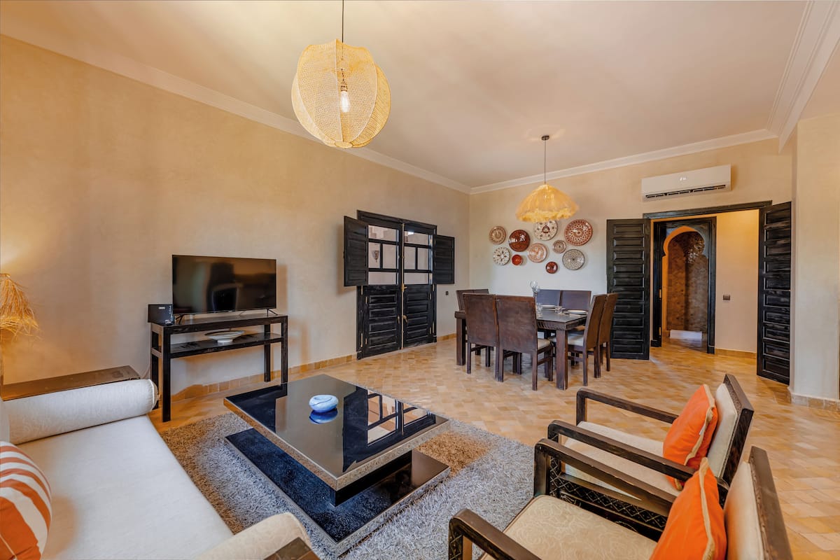 Apartment, 2 Bedrooms | Living area | TV, printers