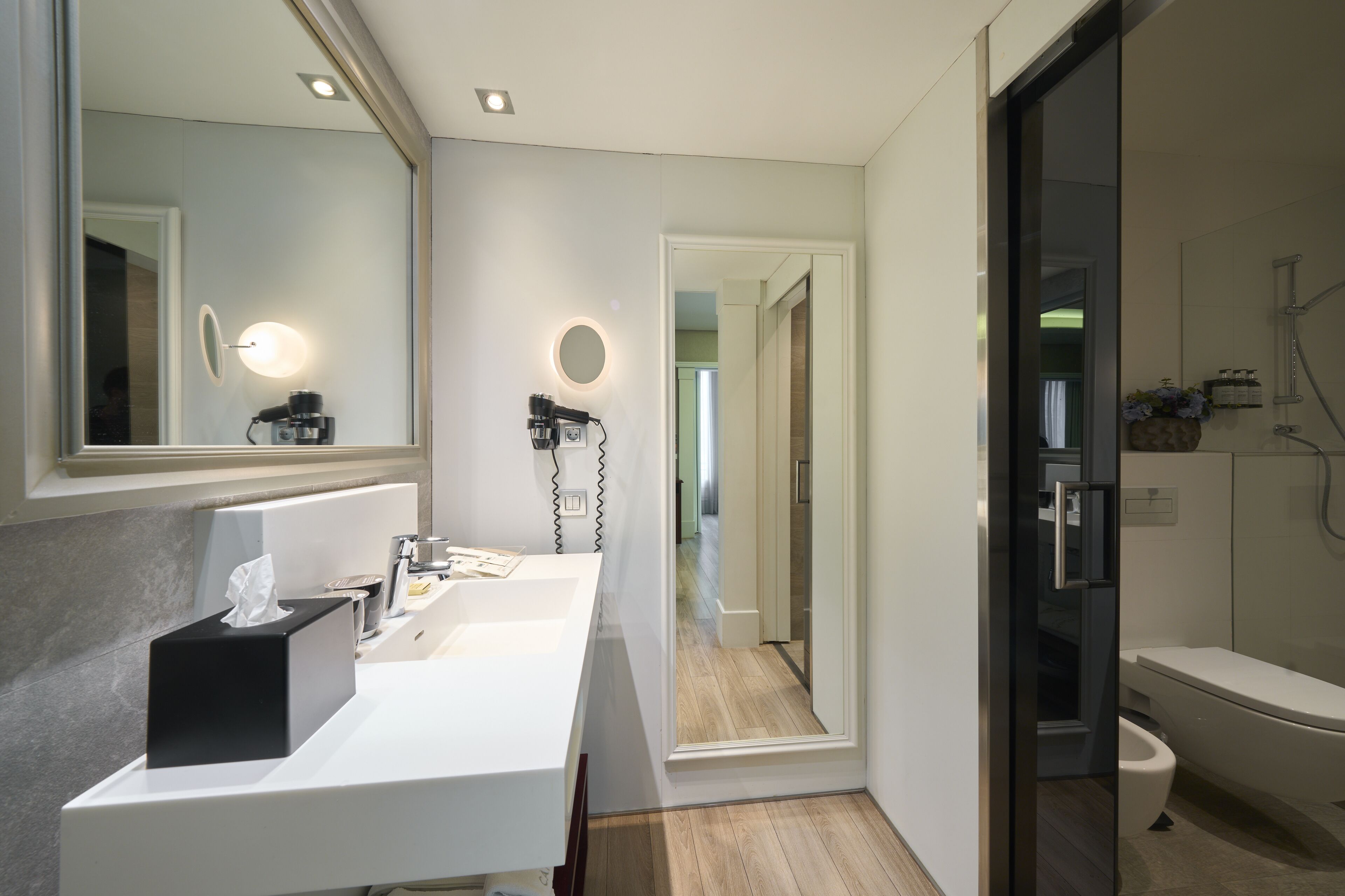 eco-friendly toiletries, hair dryer, towels