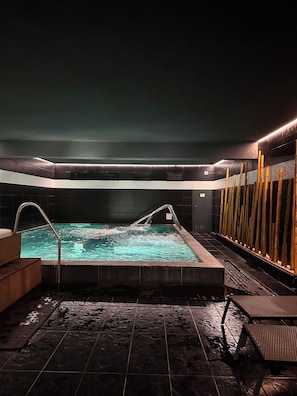 Indoor pool, seasonal outdoor pool, pool umbrellas, pool loungers