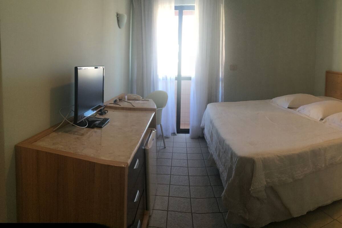 Habitación triple | Minibar, caja fuerte, cunas gratuitas y wifi gratis